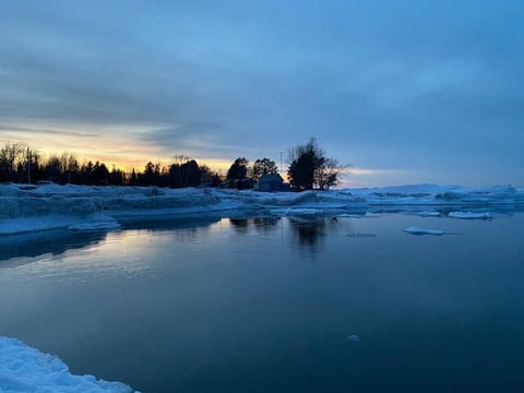 Take in the breathtaking views at Little Girl's Point on Lake Superior - just a short drive from Cabin Fevers and a must-see for snowy sunsets and icy shoreline beauty. 