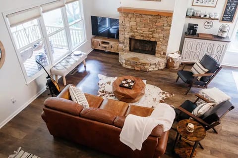 While away the hours as you enjoy our stacked-stone gas fireplace, play some games (or some music!) or watch tv. Our family room tv is tucked away for now, but the stand is equipped with wheels so you can find the perfect angle for the whole crew.