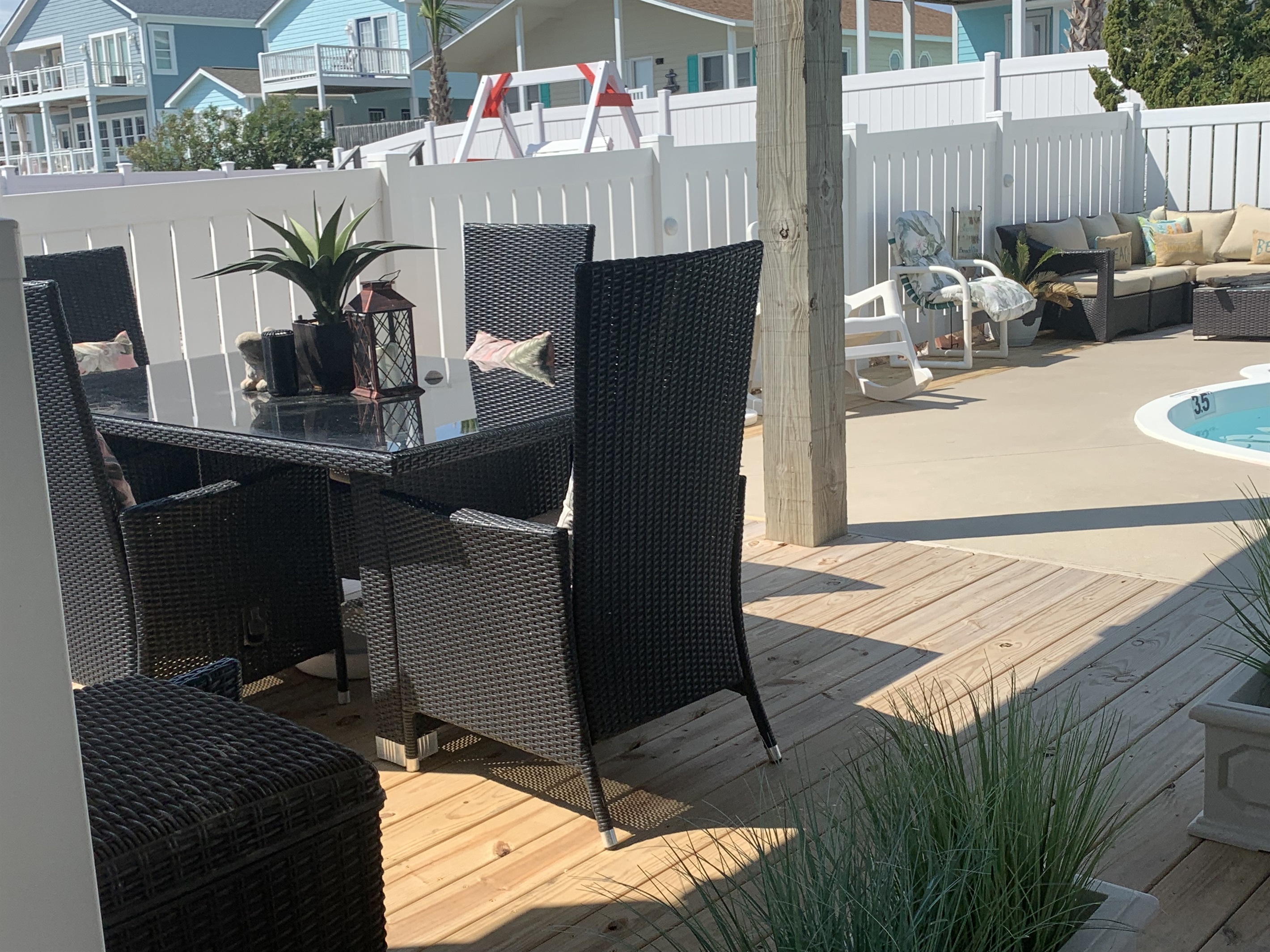 table by pool table by pool - The C's By The Sea - Holden Beach