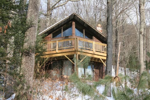 View from bottom of driveway in the winter of our A-Frame chalet