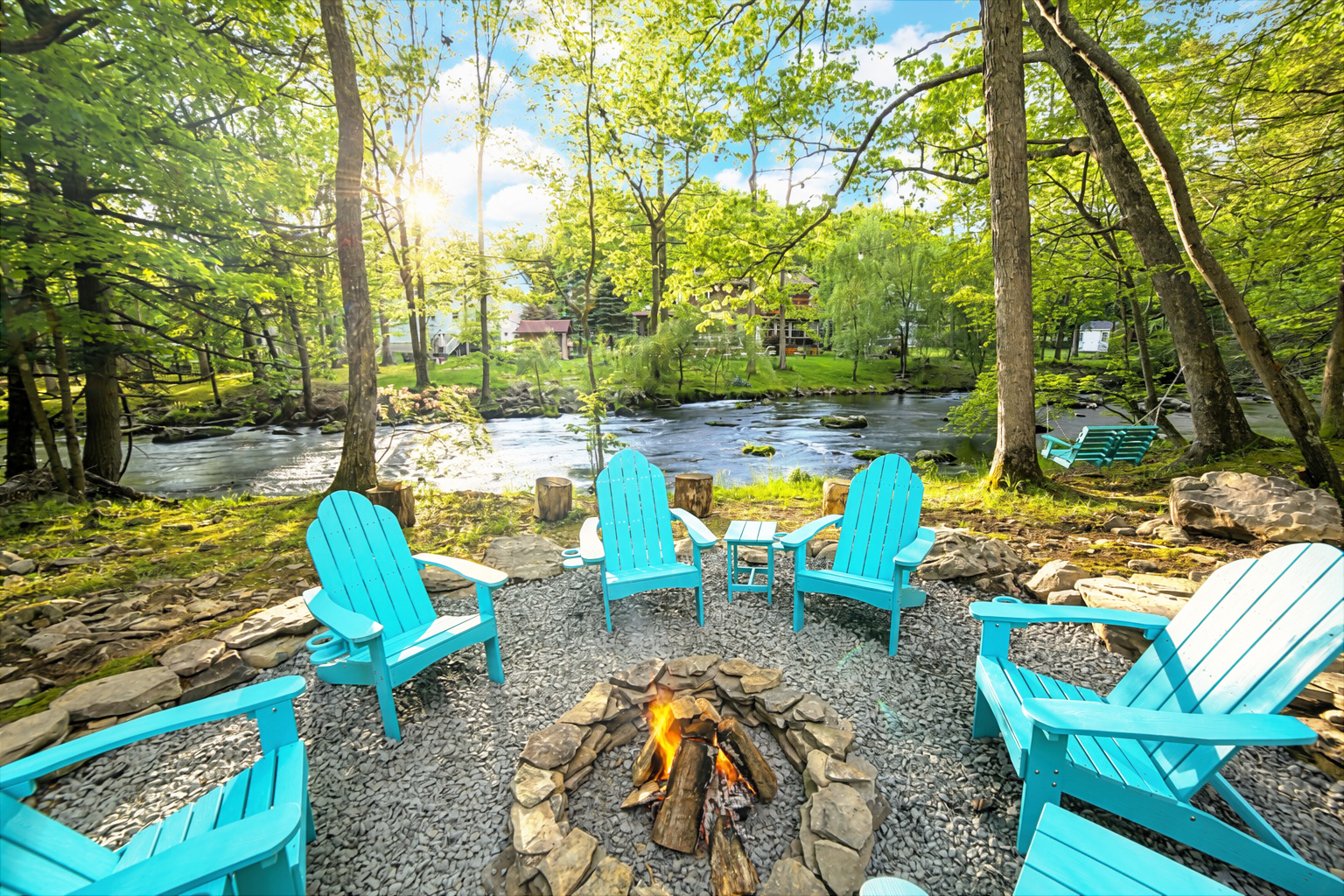 Welcome to the Poconos River House.  Enjoy the setting sun next to the stream!