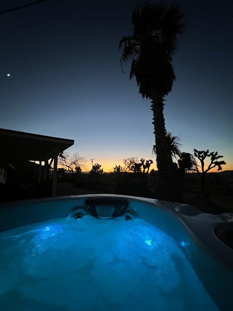 Dip in the jacuzzi with the desert sunset view