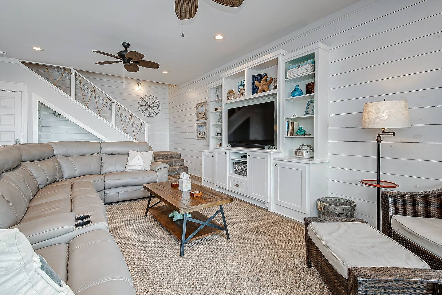 Family room has large comfortable cozy leather couch --Ideal space for the family to enjoy spending time together - Large smart TV/ DVDs- board games provided 