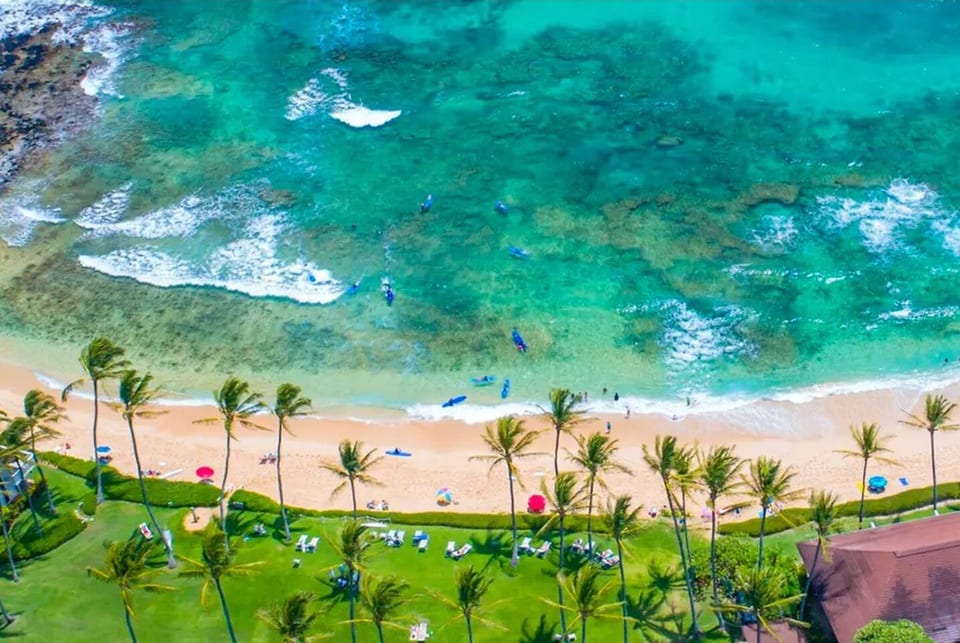 Kiahuna Plantation 248 sits on an amazing beach, perfect for surfing, boogie boards, swimming or catching a few rays. A quick 2 minute walk down the grass from our unit