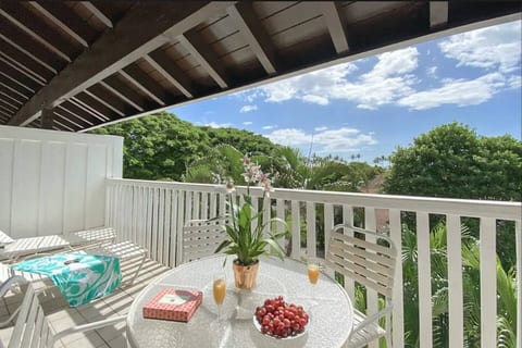 Wake up and enjoy breakfast on the lanai and soak in the ocean view and palm trees
