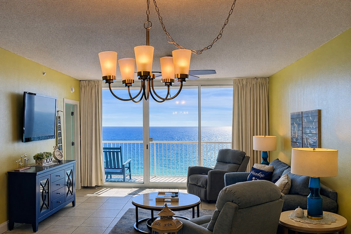 Spacious beachfront living room with access to the large beachfront balcony.  Spacious Beachfront Condo with Beachfront Master!