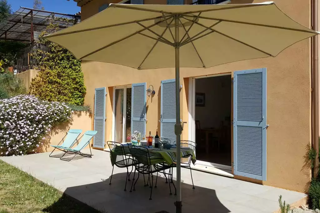 The sunny south-facing terrace perfect for eating outside, reading, sunbathing, lazing and generally enjoying at all times of year
