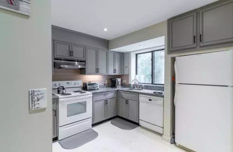 Kitchen renovated in August 2020 with new cabinet faces and granite countertops