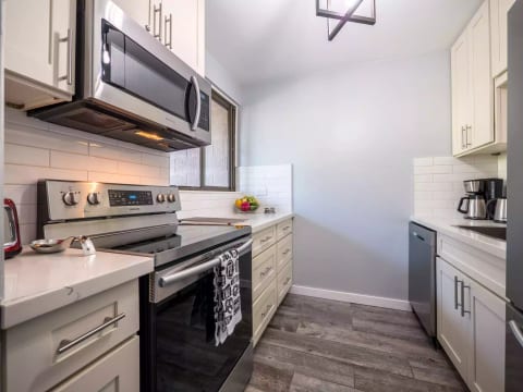 Fully stocked kitchen offers you the opportunity to cook your own meals.