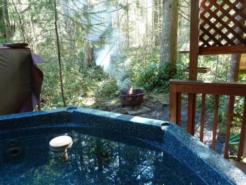 Helpful after a long hike, the hot tub is ready to ease tired muscles. And nothing says summer like an evening campfire!
