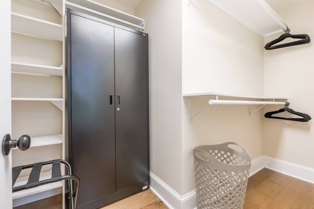 Keep your clothes clean and wrinkle-free in the spacious closet with hangers and shelves.