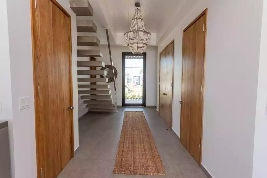 Hallway facing western entry (great room & Caribbean Sea behind you) Hallway facing western entry (great room & Caribbean Sea behind you) - Spectacular beachfront home with pool, gym, more! - San Pedro