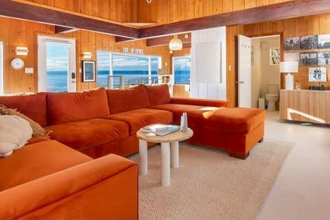 The oversized sleeper sectional is perfect for spreading out for quality time, a great midday nap, taking in the ocean lapping up or watching something on the 65” smart screen in front of the electric fireplace. Memory foam queen mattress folds out.