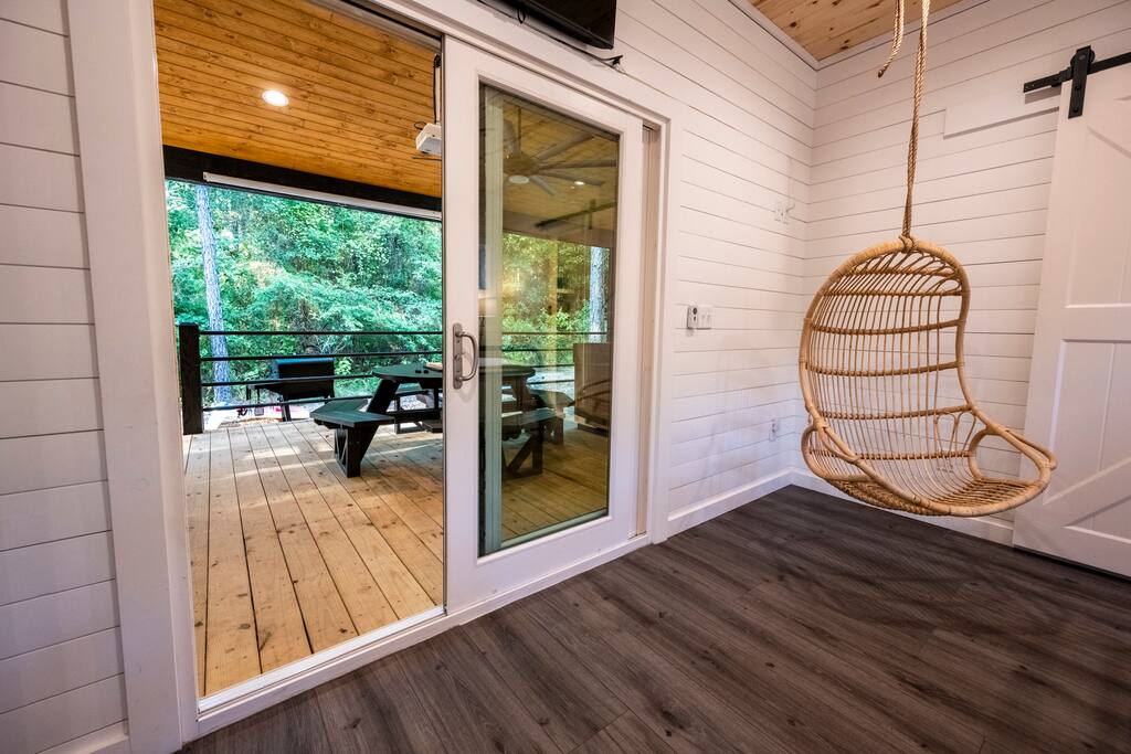Guests can enjoy the beautiful view & relax in the cozy hanging chair from the master bedroom.