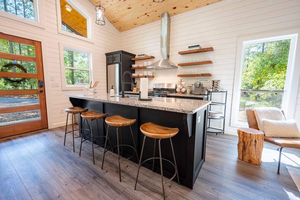 Seating for 4 at the island and another 3 on the built-in bar height dining table.