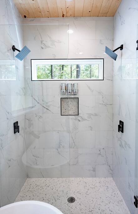 Dual shower heads in fully tiled shower