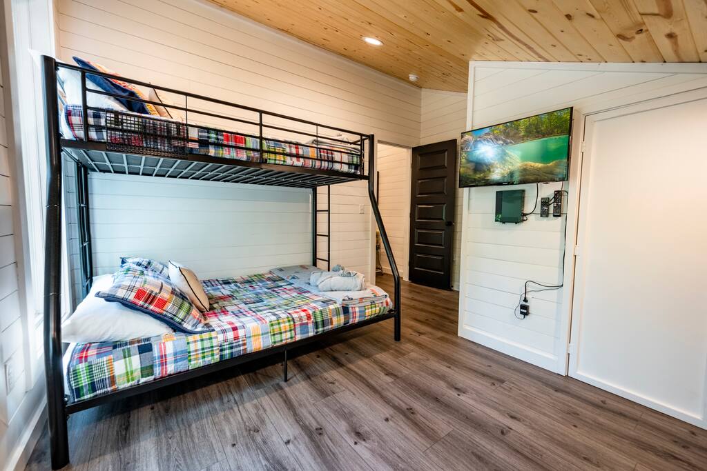 Upstairs bunk room with twin over full bunk beds.  32" smart TV with DVD player.