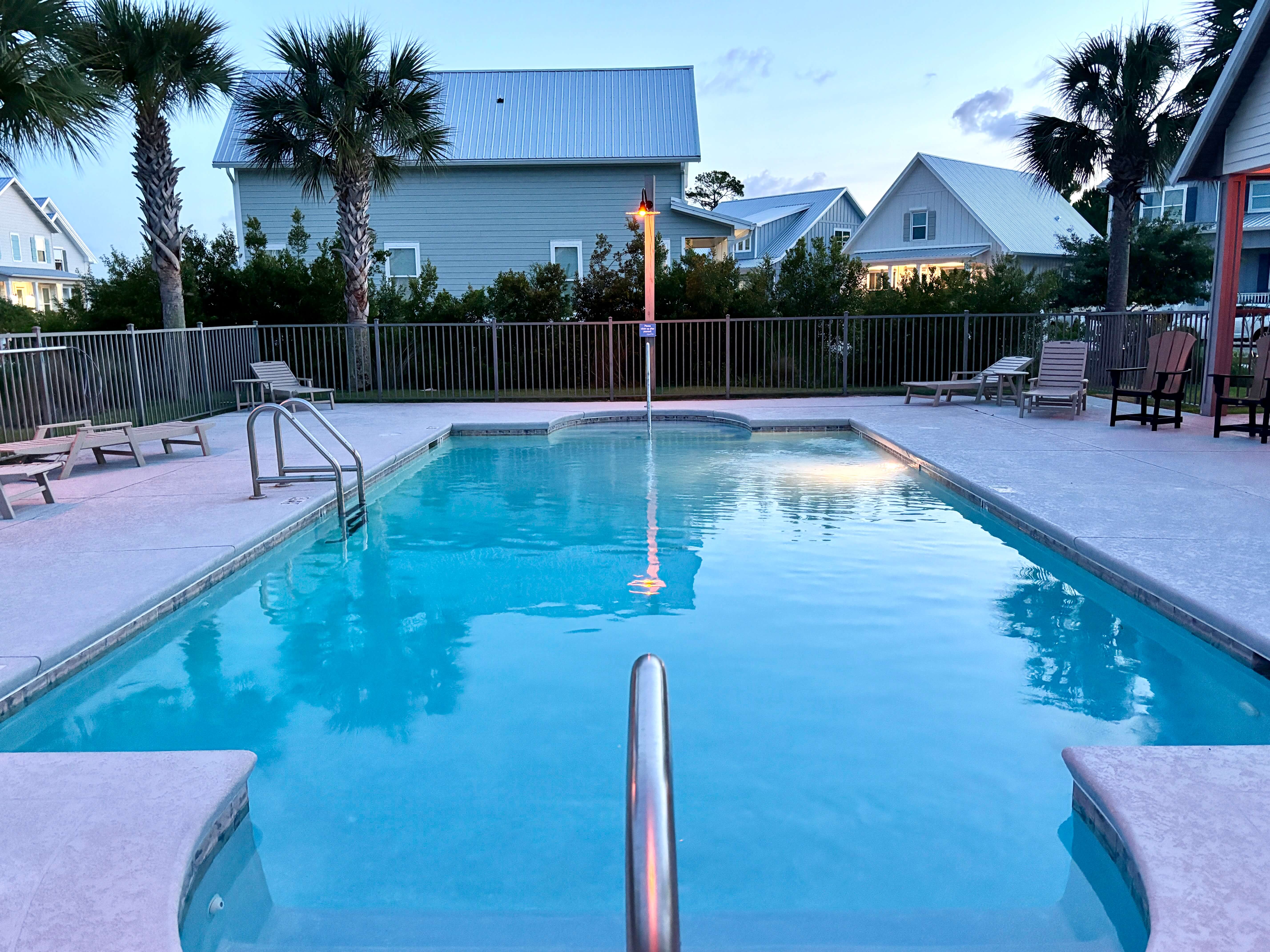Dive into calm evenings and cool waters at the public pool near your beach town getaway.