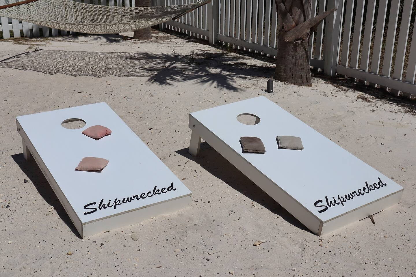 Keep score if you want to while you play a game of "Shipwrecked" corn hole in the private fenced in sandy backyard that also backs up to a canal of water. This area is such a great area for backyard cookouts & relaxing!