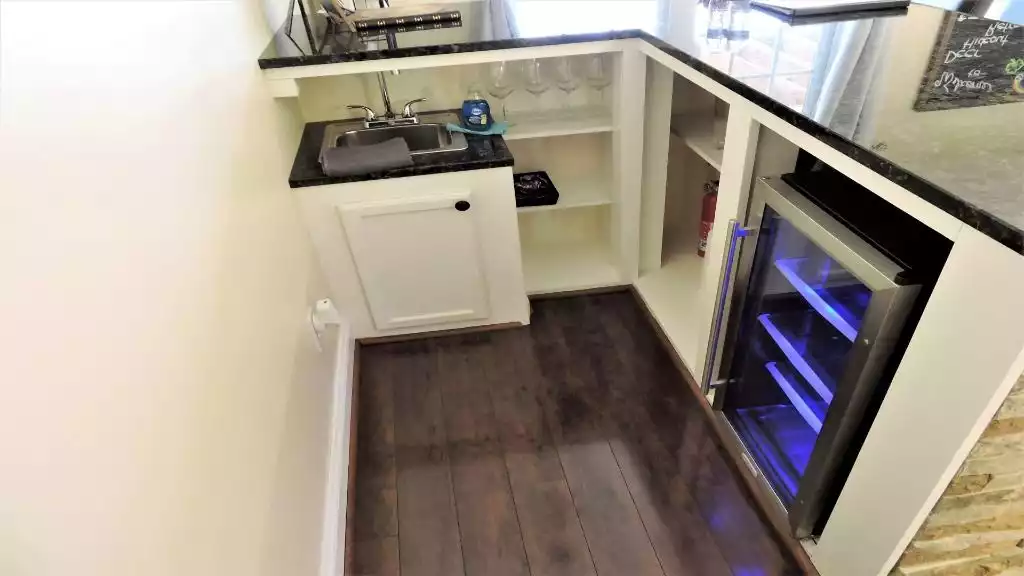 Wine cooler/refrigerator in bar area. Wine cooler/refrigerator in bar area. - Deer Hideout Retreat - Palmyra