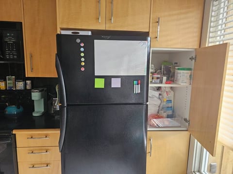 Full size refrigerator and freezer.