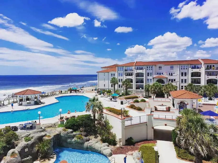 View from our balcony overlooking the pools and beach