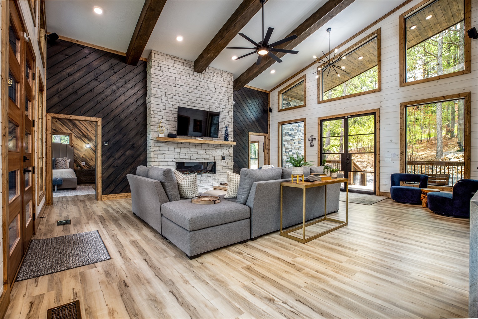 Living Room With 65" TV - Once Upon A Pond - Broken Bow