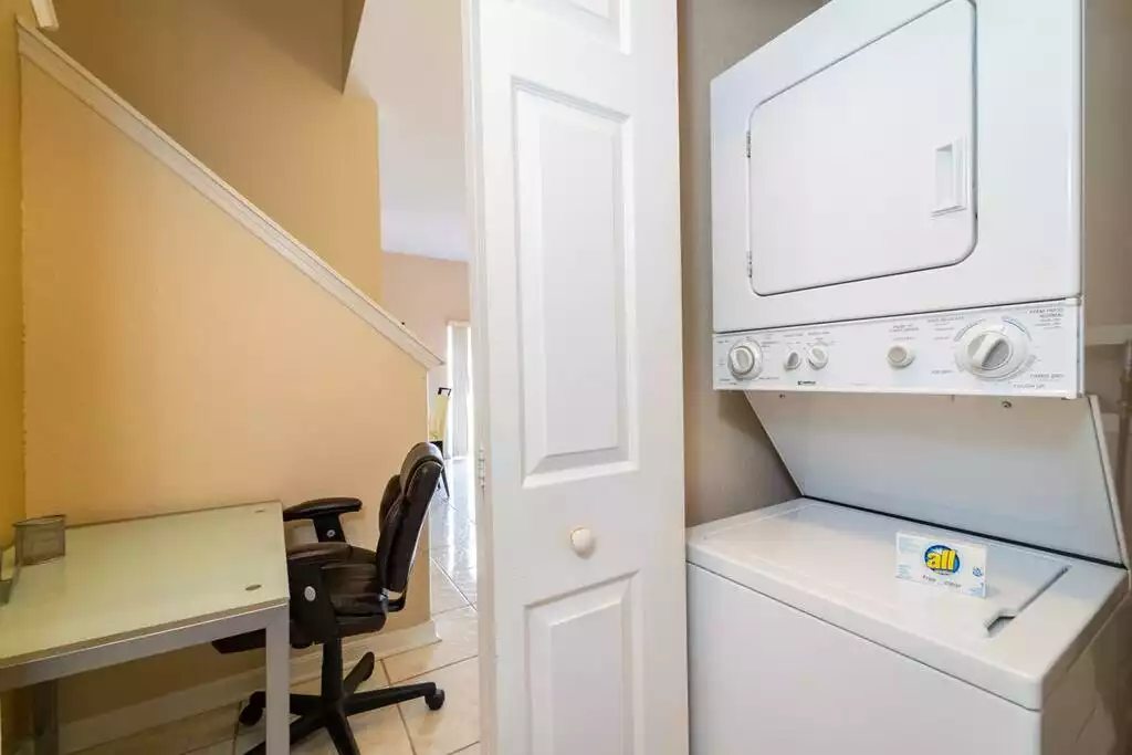 laundry facilities showing desk space - Regal palms home, gated community ,pool (712CAL) - Davenport