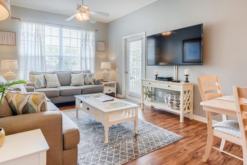 Warm and inviting living area with large flat screen TV.