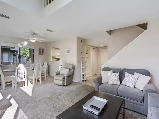 Light and bright living area with neutral furniture