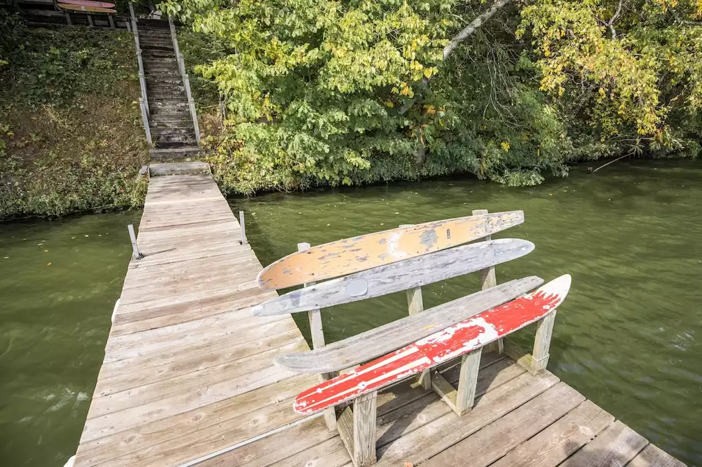 The dock on Big Chetac has a swim ladder and bench to relax on! - Secluded Getaway - Birchwood