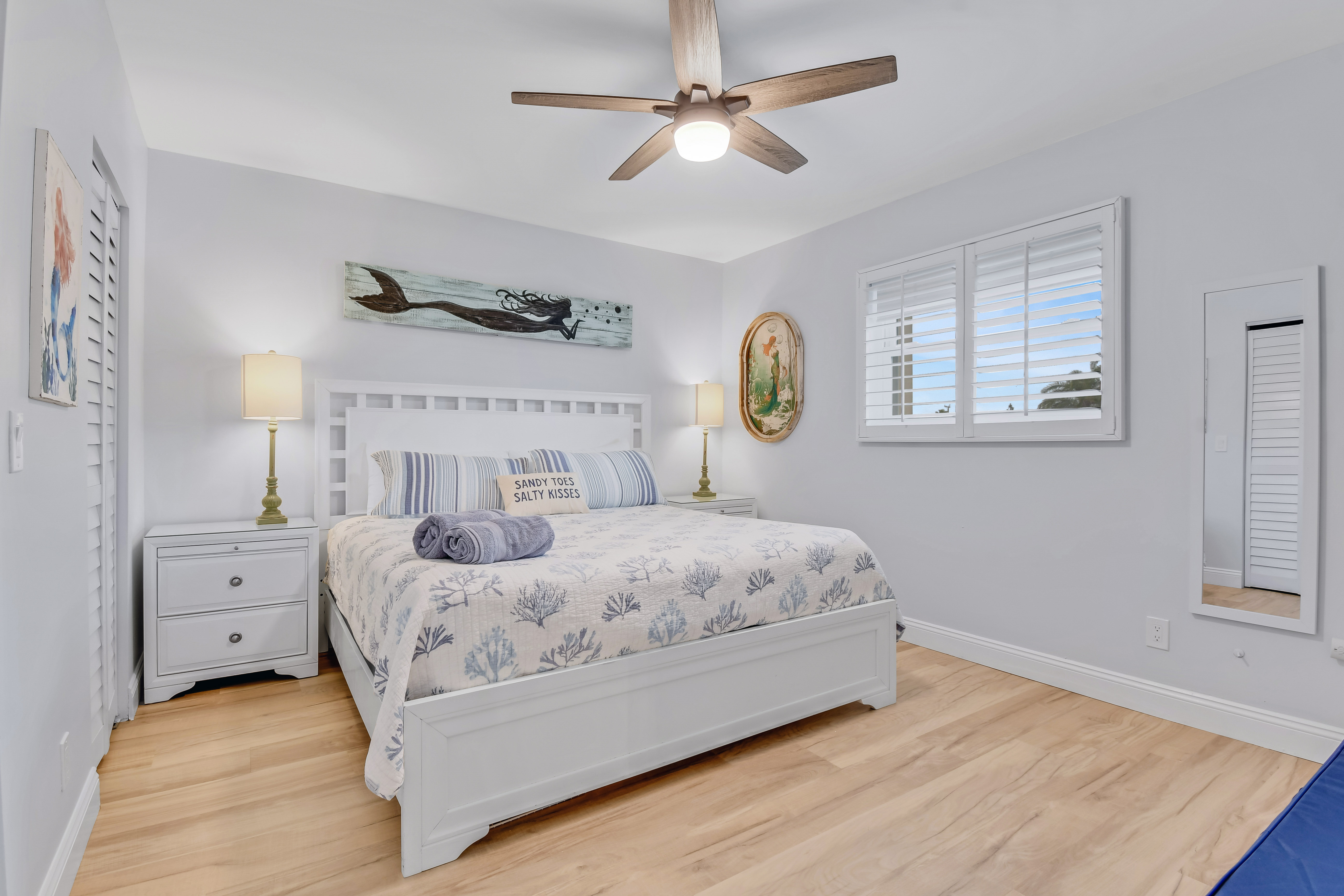 Relax in this cozy bedroom with a plush king bed, perfect for recharging after a day of adventure. Funshine Pointe Capri - Newly Renovated - Intercoastal Views