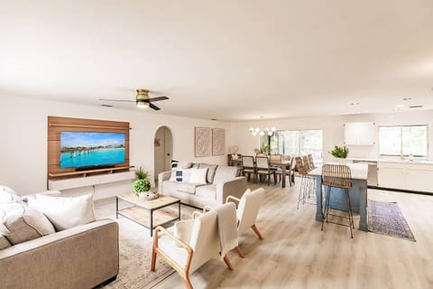 Spacious Open Living Room. Fully renovated throughout. 65” smart tv with Netflix and Roku. Games and books are located in the entertainment center.