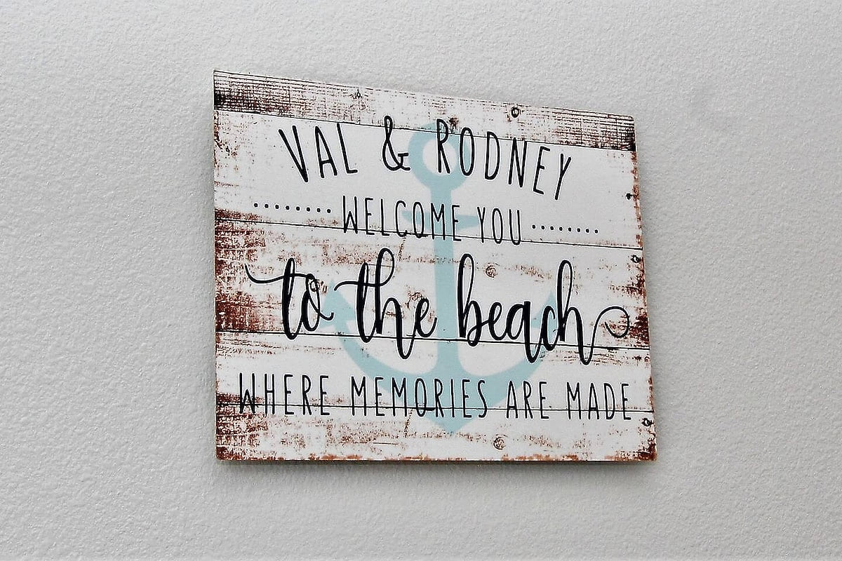 Coastal welcome sign adds charming, beachy vibes to your stay