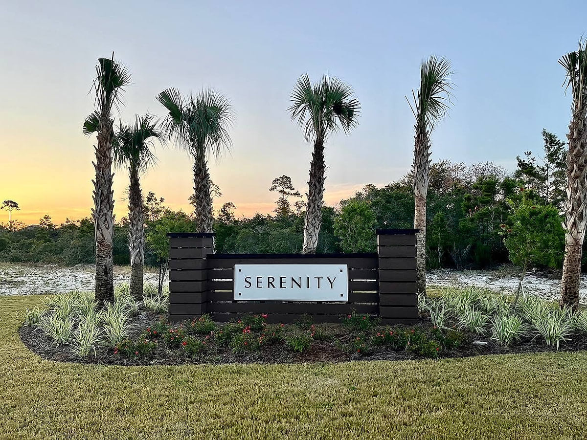 Welcome to Serenity: palm-lined entrance with manicured gardens