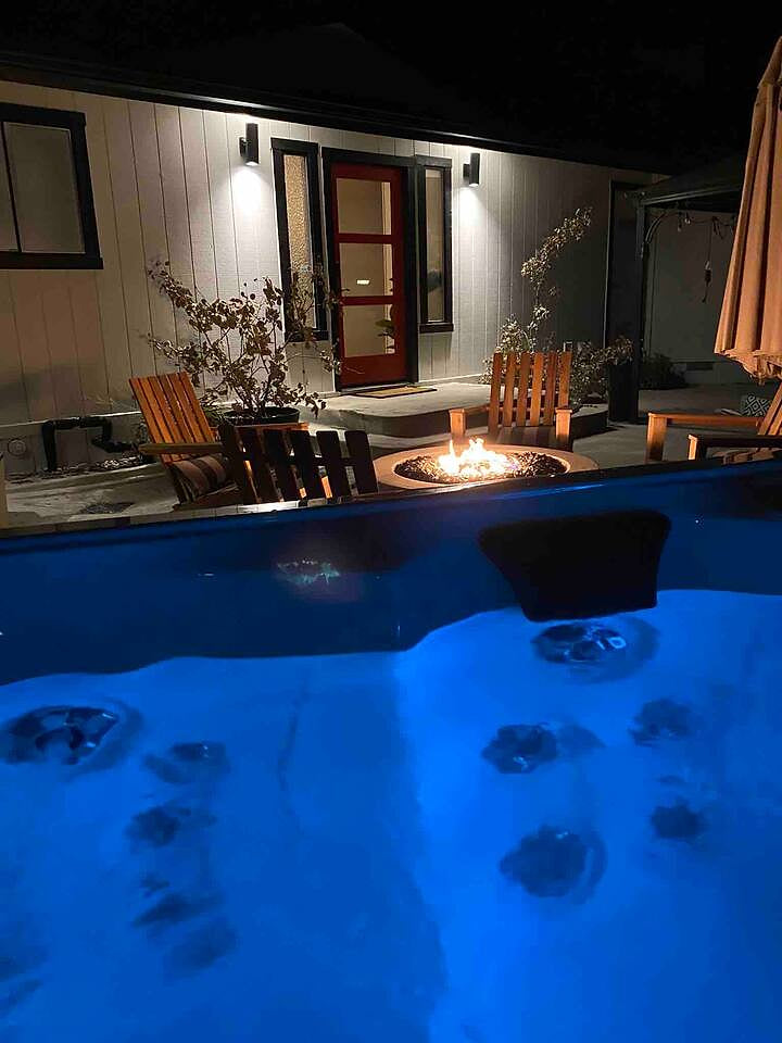 Soak in the hot tub and warm up next to the fire pit!