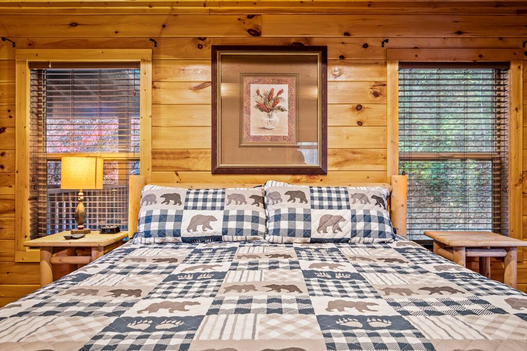 Master bedroom on the main level of the cabin.