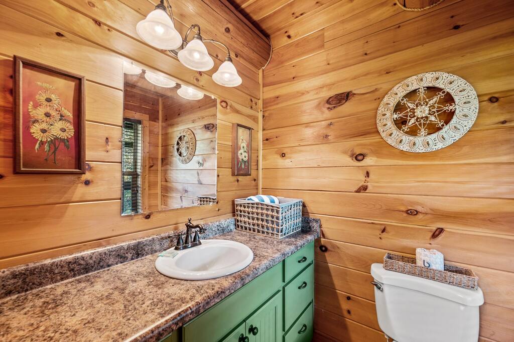 Half bath located off the kitchen.