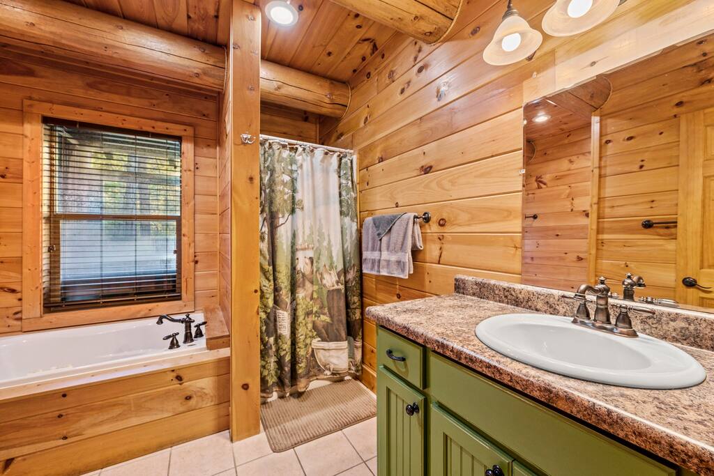 Master bathroom with a shower and tub.