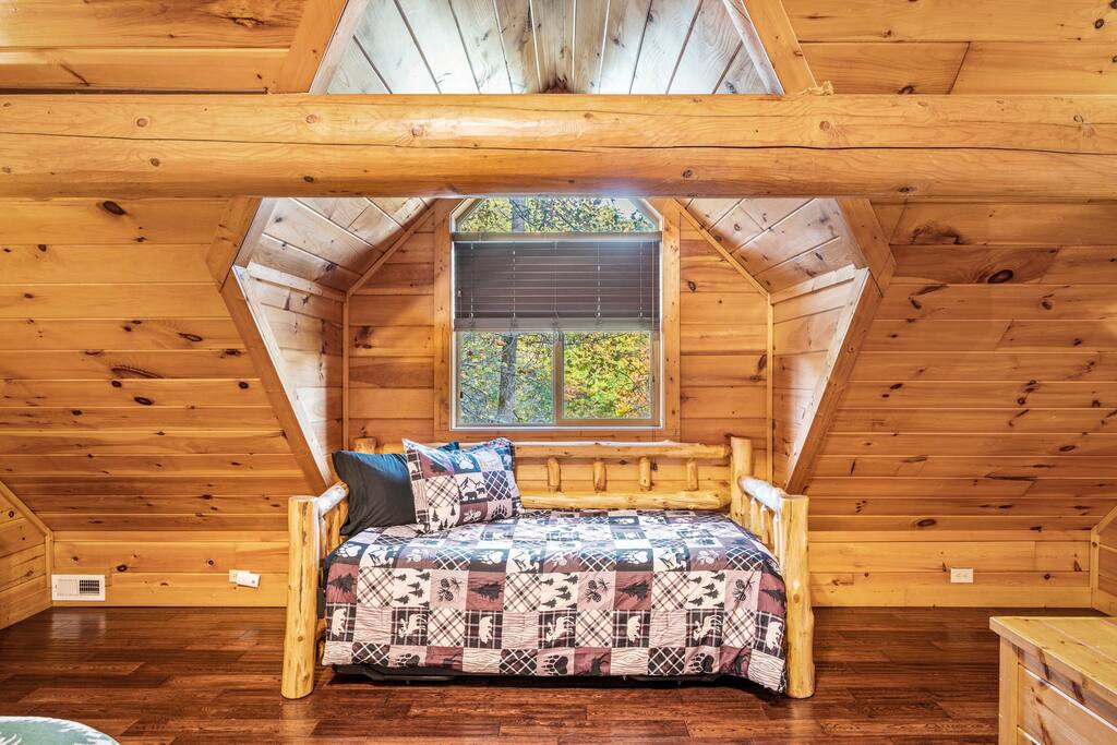 Loft daybed that pulls out into two twin mattresses.