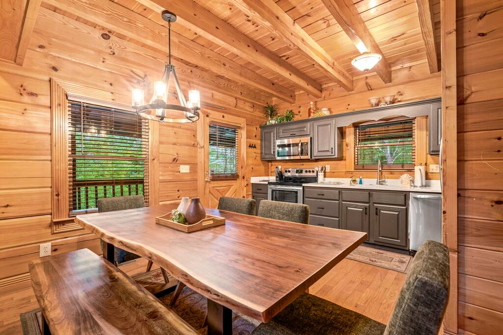 Large dinning room table fits eight.  Hand crafted and tastefully designed.