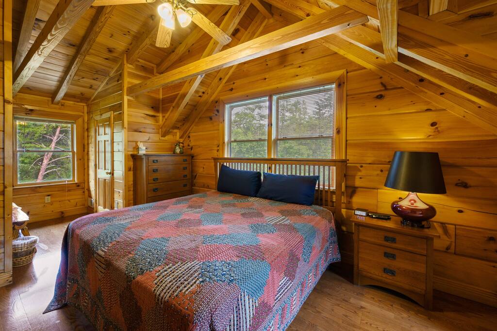 Upstairs master bedroom featuring a King bed.