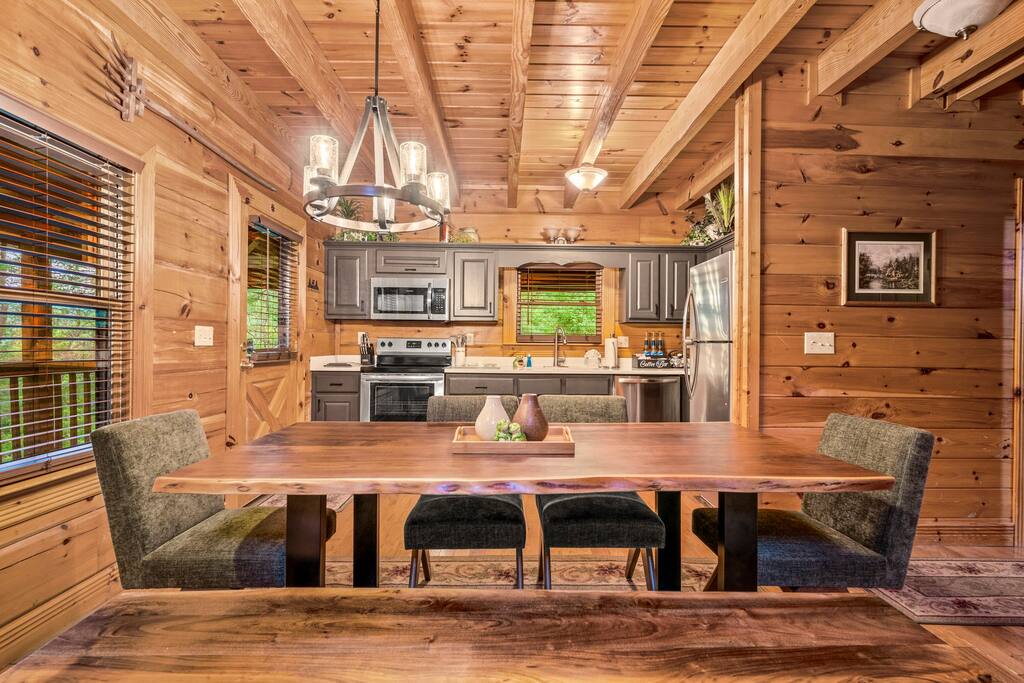 This live edge dinning room table installed by local craftsman is sure to a focal point of those family meals.