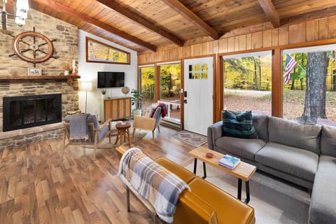 The oversized windows brings the outdoors in! Enjoy your morning coffee as the sun floods the home.