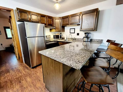 The kitchen has a full size fridge, stove, microwave and dishwasher. A blender and toaster are also available for your use. We have plenty of pots and pans for you to use during your stay. We also provide dishware and silverware for adults as well as kids. An assortment of spices are also available for your use. A starter pack of coffee is provided as well.