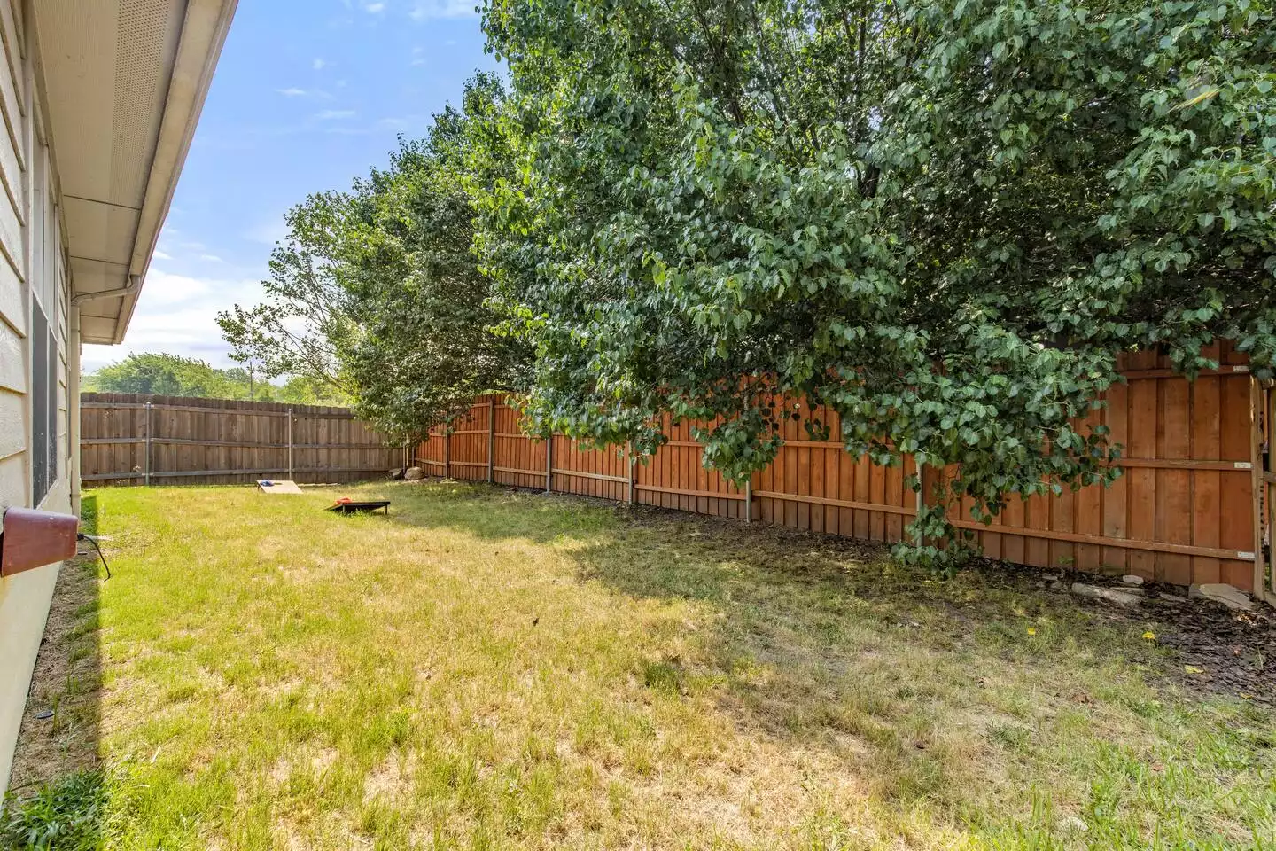 Fully fenced backyard with trees that allow you privacy from the neighbors. Fully fenced backyard with trees that allow you privacy from the neighbors. - The Birdhouse - Keller