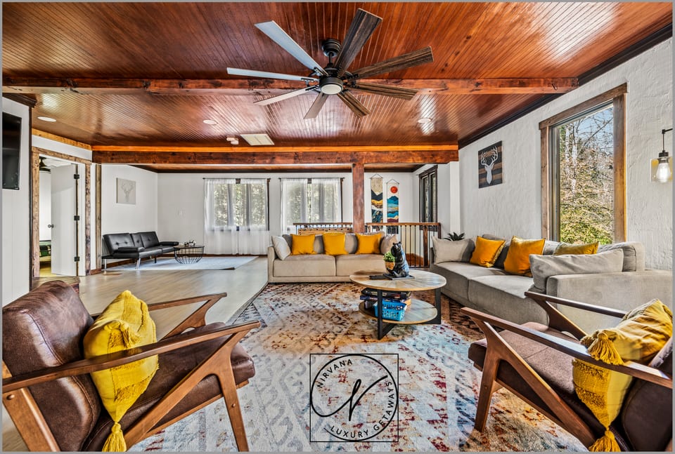 Luxury Cabin w/ 120” Home Theater, 4K UHD & Dolby Sound, ideal location! Relax in Hot Tub, gather by Outdoor Fireplace, enjoy the Game Room & Bar Room, & unwind in 5 Master Suites (5BR/5BA)!
