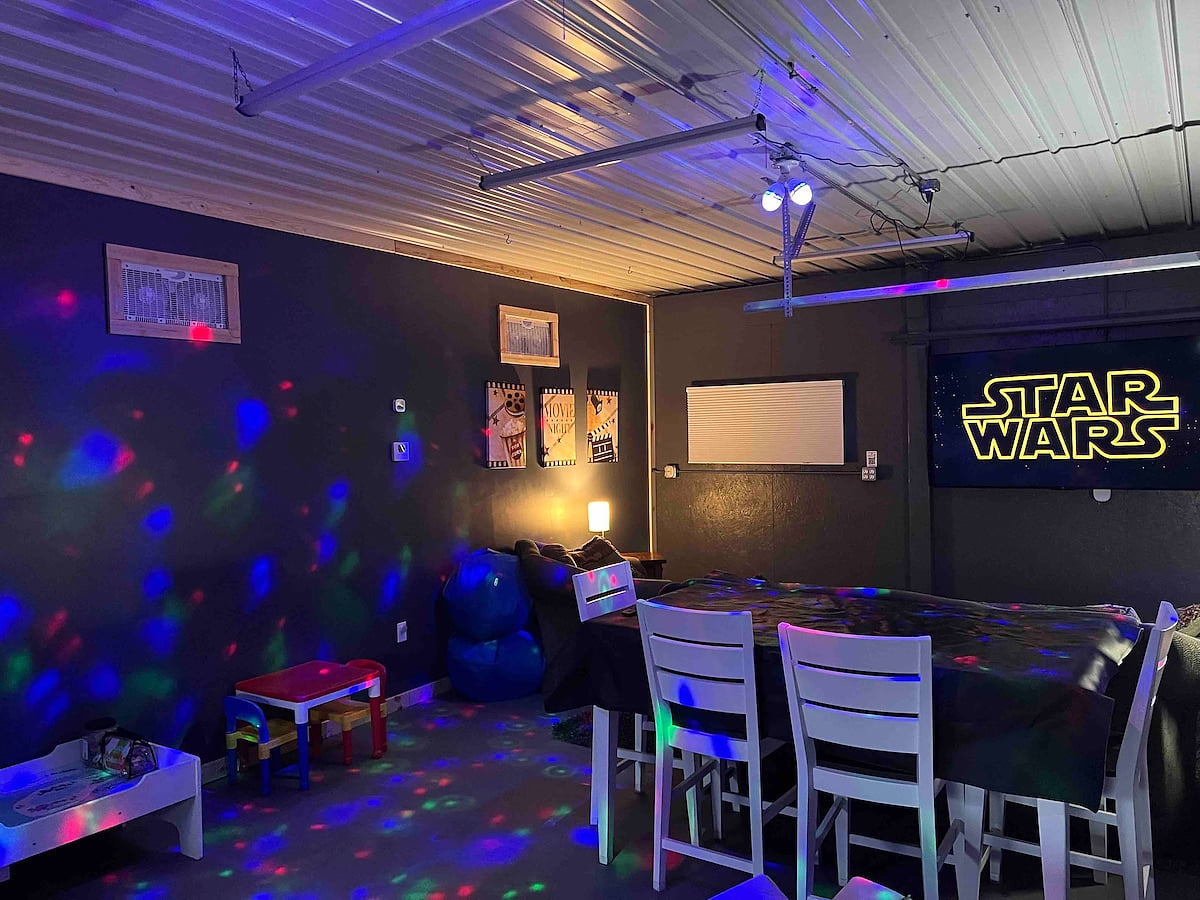 Our Game Room / Theater is perfect for family fun, watching football (or playing football), and relaxing in front of a 75” UHD Roku TV. 