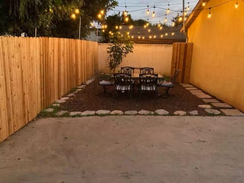 Enjoy Southern California's inviting outdoor climate with a private backyard complete with LED lighting and outdoor furniture.