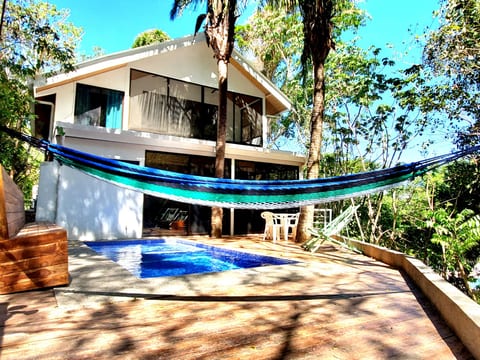 Backyard with private pool. All new teak wood decking and bench seating.